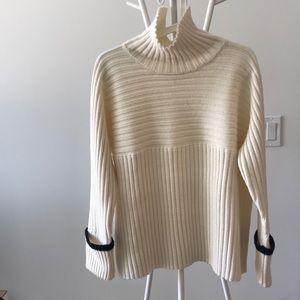 White ribbed turtleneck sweater